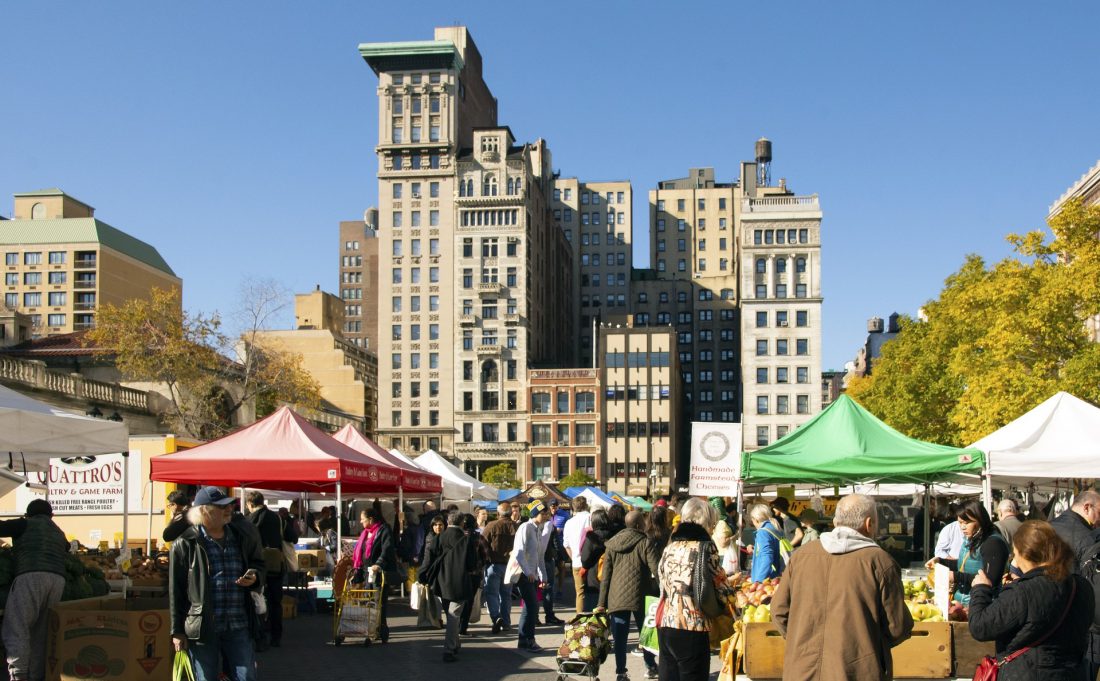 people shopping at the farmer's market in Union Square NYC