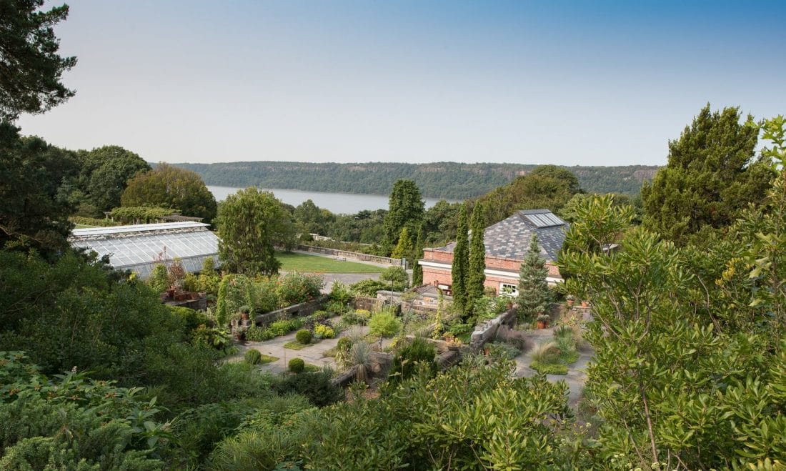 view of the Hudson and a garden at Wave Hill Park in the Bronx, NYC